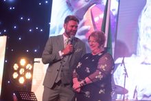 Singer Brian McFadden with winner Gill Wheeldon, founder of The Bubble Foundation. Image courtesy of Steve Pope Photography