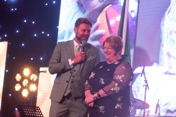 Singer Brian McFadden with winner Gill Wheeldon, founder of The Bubble Foundation. Image courtesy of Steve Pope Photography Singer Brian McFadden with winner Gill Wheeldon, founder of The Bubble Foundation. Image courtesy of Steve Pope Photography