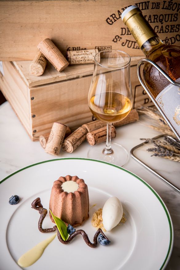 Hazelnuts dacquoise, rum sultanas bavaroise, praline mousse, rum ice cream.