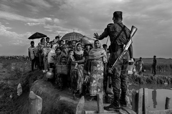 Time to Act exhibition -- One of 30 photographs by Kevin Frayer in the exhibition