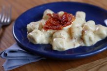 Polenta gnocchi with Montasio cheese and San Daniele prosciutto