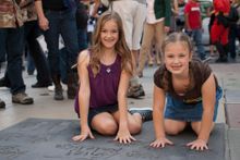 Famous handprints and footprints at Hollywood's TCL Chinese Theater is a visitor favorite on CitySightseeing's Hop-On Hop-Off Re