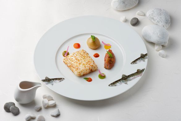 Rech by Alain Ducasse - Basquaise-style line caught sea bass on the Aquitaine Coastal Tour de France Menu. 