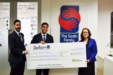 Radisson Blu Plaza Hotel Sydney presenting the cheque to The Smith Family CEO, Lisa O'Brien