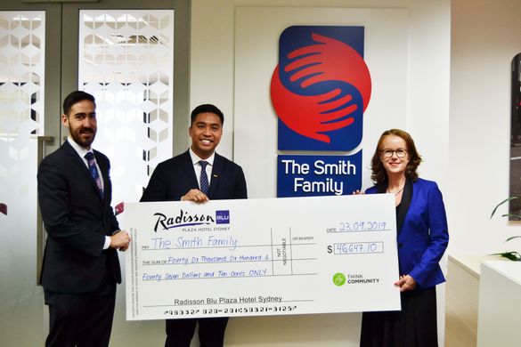 Radisson Blu Plaza Hotel Sydney presenting the cheque to The Smith Family CEO, Lisa O'Brien