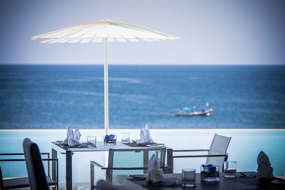 Poolside and Longtail Boat