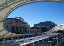Denver Union Station includes eight train tracks located just behind the building. One of the trains will take visitors to and f