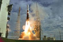 For The Planet - A Delta IV rocket roars off the launch pad of Launch Complex 37 at Cape Canaveral Air Force Station, lifting an