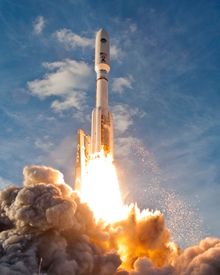 Raw Power - An Atlas V rocket thunders off the ground, carrying a military satellite into Earth orbit.