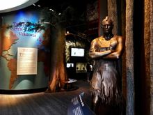 A statue of Powhatan greets visitors to Jamestown Settlement's expansive exhibition galleries, refreshed in 2019 with new immersive experiences.