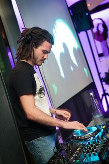 French Kiwi Juice (FKJ) spinning behind the decks 