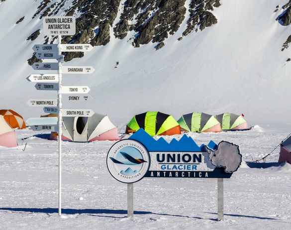 Union Glacier Camp and distance marker signs © Russ Hepburn