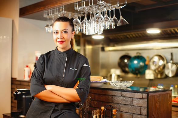Macao chef Palmira Pena prepares dishes for the Taste of Macao food festival in Sydney, Australia