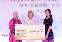Mao Miyazawa, General Manager, Conrad Macao, Cotai Central (right) and Donna Campbell, Executive Director, Public Relations, Sands China Ltd. (left), present the cheque to Hong Kong Cancer Fund Founder and Chief Executive Sally Lo.