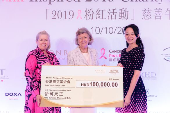 Mao Miyazawa, General Manager, Conrad Macao, Cotai Central (right) and Donna Campbell, Executive Director, Public Relations, Sands China Ltd. (left), present the cheque to Hong Kong Cancer Fund Founder and Chief Executive Sally Lo.