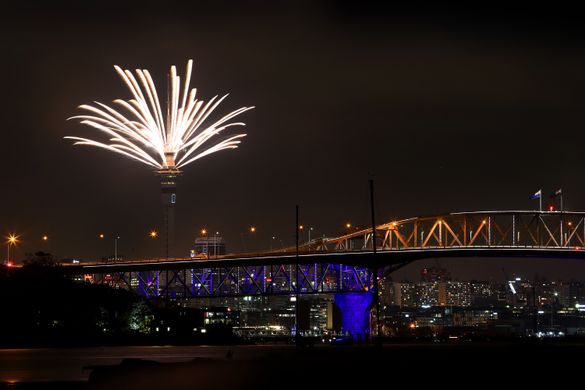 The Auckland Harbour Bridge and the Sky Tower light up New Year's Eve 2018
