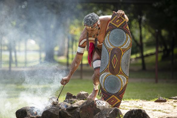 Experience a fire making ceremony at Tjapukai Aboriginal Cultural Park.