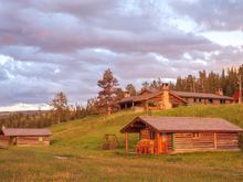 Cabins at dusk, Nine Quarter Circle Ranch, Montana