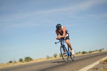 Adriel 'Bacon' Young cycles against 25kph headwind in the 2014 Cannington Dirt n Dust Triathlon