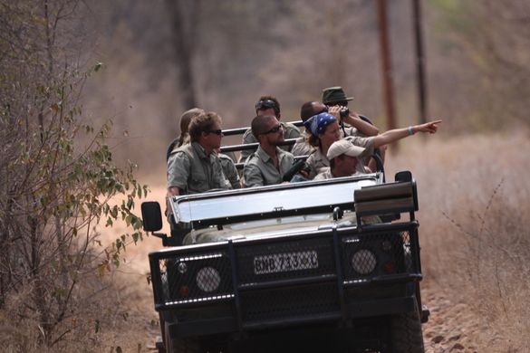 Vehicle with guides in field
