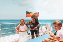 Connect with ancient wisdom in Cairns & Great Barrier Reef on Dreamtime Dive & Snorkel.