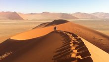 Climbing Dune 45, Namib Naukluft National Park, Namibia