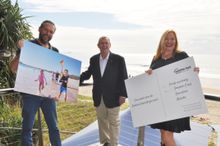 Mark Darin (left) and Caroline Hutchinson (right) from 92.7 Mix FM with Visit Sunshine Coast Chair David Ryan (centre)
