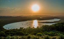 The sun sets over the Endeavour River in Cooktown.
