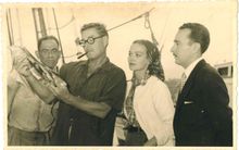 Local Mallorcan businessman Jaime Canudas meets Errol Flynn aboard his yacht ZACA in 1955 in Palma's Real Club Nautico yacht club