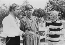 Taking a break from filming in 1965 are (l-r) Michael Caine, Robert Graves and Adam Faith