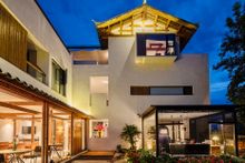 Clean, contemporary architecture with traditional Naxi furnishings