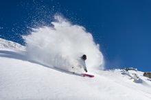 A skier enjoying some powder turns in Thredbo over winter