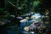 Girl Sitting at Mossman Gorge 