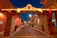 Holiday lights shine along Aviles Street - the oldest street in the oldest city. 