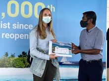 The Managing Director of MMPRC Mr. Thoyyib Mohamed congratulating Jasmin.