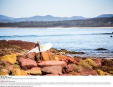 Surfing at Bar Beach, Merimbula