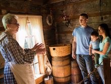 A family learns about life in the mid 19th-Century at Historic Collinsville Pioneer Settlement.