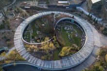 Copenhagen Zoo, BIG-Bjarke Ingels Group, Schønherr Landscape Architects and MOE have collaborated on a yin and yang-shaped Panda House that resembles the Panda’s natural habitat and creates a peaceful environment for one of the world’s rarest mammals. 