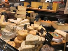 Cheesemongers visit on an Annecy walking tour, France