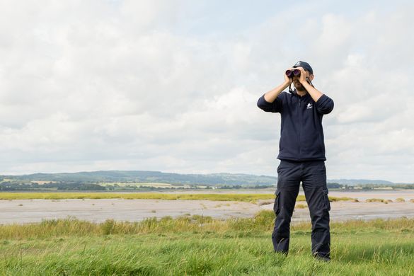 Reserve Warden Scott Petrek near the Severn Estuary at WWT Slimbridge.