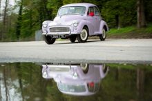 A Morris Minor 'Million' tears around a specially set out circuit at the 'Drive Dad's car' attraction - 30 cars will be available to drive.  With all the cars finally revealed, The Great british Car Journey launches in a refurbished warehouse in the old w