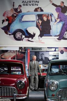 Richard Usher CEO of Great British Car Journey with period advertising banners hanging in the background.  With all the cars finally revealed, The Great british Car Journey launches in a refurbished warehouse in the old wireworks, Ambergate Derbyshire