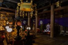The Strings of Virtue stretch from the statue, across the room, to outside of the temple 