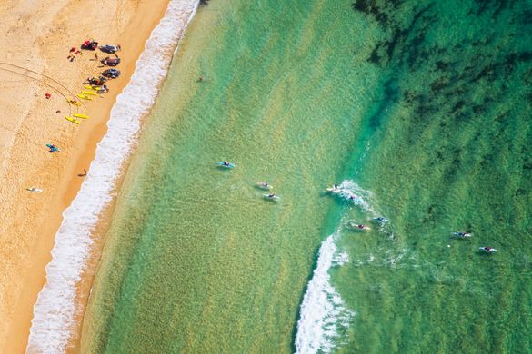 Aerial of paddleboarders at Toowoon Bay, Central Coast. Aerial of paddleboarders at Toowoon Bay, Central Coast.