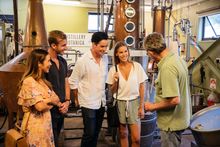 Friends enjoying a tour through Distillery Botanica, Erina