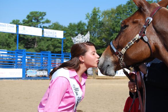 Miss Benson Kisses the Grand Champion Mule
