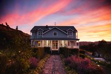 Sun setting over accommodation at Nimbo Fork Lodge, Killimicat
