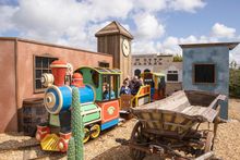 A family enjoy the new Western Mine train