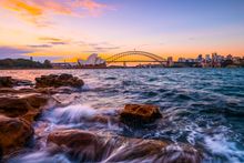 Sun setting over Sydney Harbour in Summer.