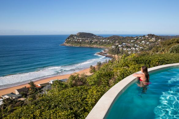 Woman enjoying ocean views from Jonah's on Whale Beach. Woman enjoying ocean views from Jonah's on Whale Beach.